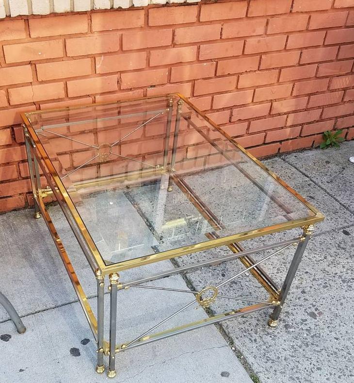SOLD. Brass Glass Topped Cocktail Table, $235.
