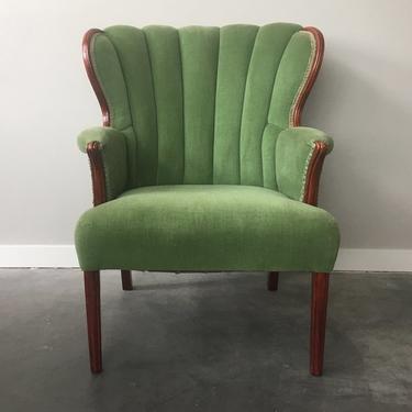 vintage vibrant grass-green channel back chair.