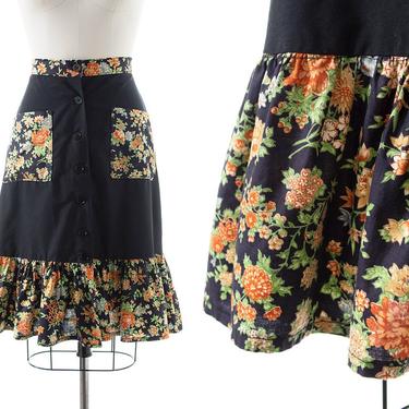 Vintage 1970s Skirt | 70s Floral Printed Black Cotton Patchwork Tiered Ruffled Button Up A-Line Boho Skirt with Pockets (small/medium) 