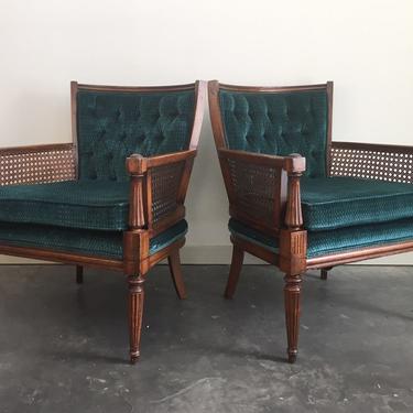 pair of vintage cane armchairs in teal.