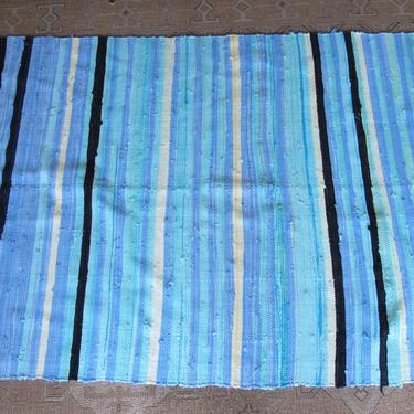 Vintage Blue Fabric Scrap Rug with Yellow, Black and White Accents 