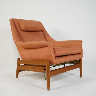 Teak reclining chair with pink upholstery
