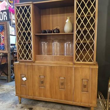 Mid Century Walnut Hutch with brass lattice detail. 5ft wide 20 inches deep 74.5 inches high. 
