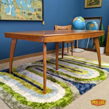 Mid-Century Modern maple dining table with one leaf by Heywood Wakefield