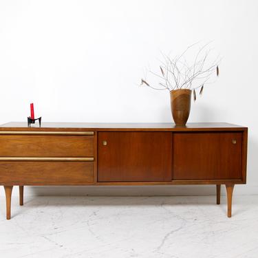 Vintage mcm low credenza / tv stand with 2 drawers and storage compartment with sliding doors | Free delivery in NYC and Hudson areas 