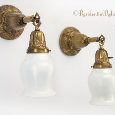 PAIR Beardslee embossed brass wall sconces with Quezal calcite glass shades, circa 1910s