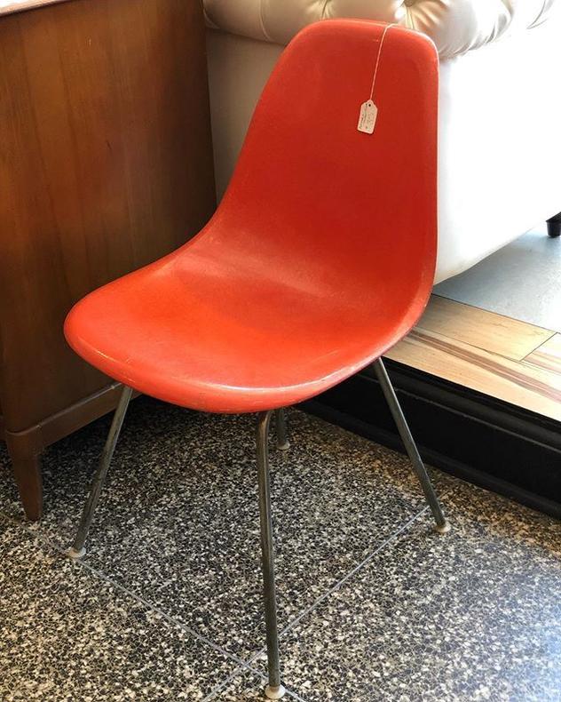                   Single Herman Miller orange fiberglass shell chair - $85