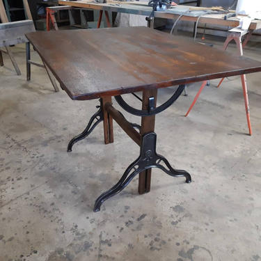 Vintage industrial drafting table with cast iron legs 