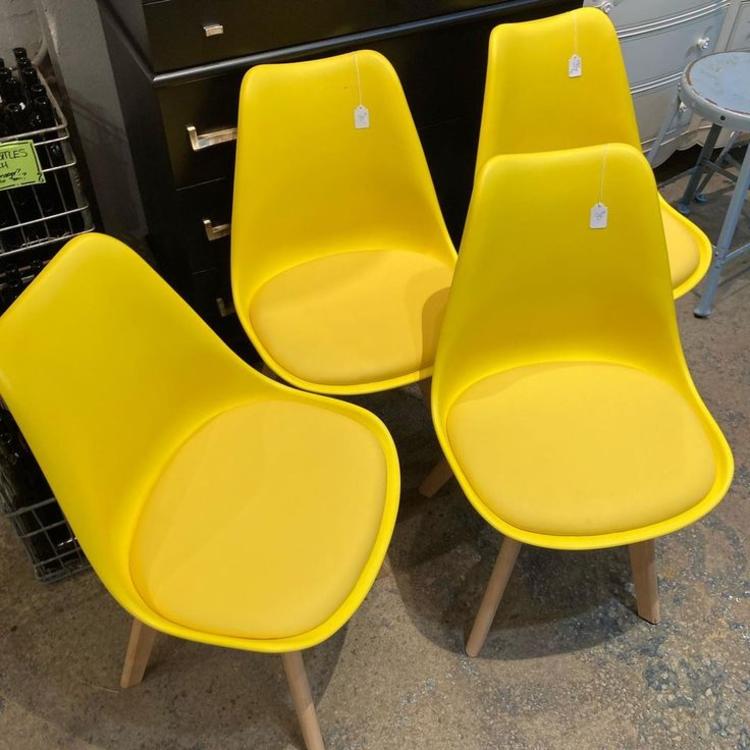 Really comfy really yellow scoop chairs with padded seat. 4 available 19.5” x 16” x 32” seat height 17” 