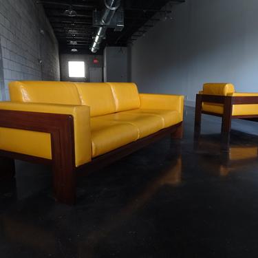 Bastiano sofa and armchair by Tobia Scarpa yellow upholstery 