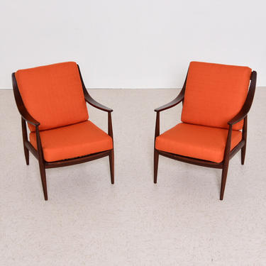 Orange Danish vintage lounge chairs restored