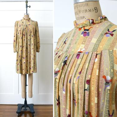 vintage 1970s puff sleeve ruffle dress • pleated novelty print trapeze dress in golden yellow 
