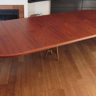 Newly-restored, extra-long Danish teak extendable dining table by Henning Kjaernulf by Sorø Stolefabrik 