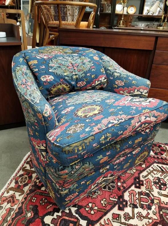                   Vintage barrel chair with boho style fabric