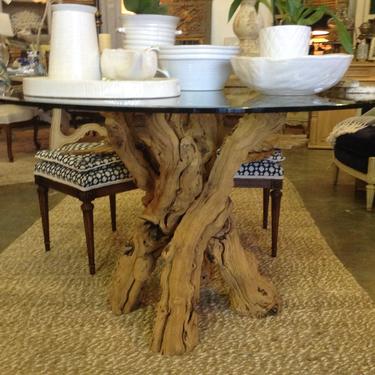 SOLD - Vintage twisted driftwood table with Glass top.