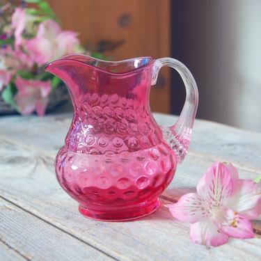 Vintage cranberry glass pitcher / small pink blown glass pitcher creamer / footed pitcher with clear glass handle / vintage glassware 