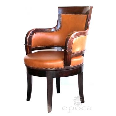 a rare and handsome french empire walnut leather-upholstered swivel desk chair