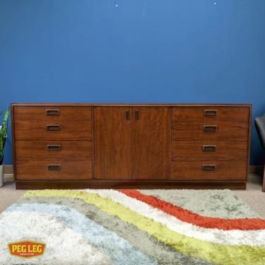 Mid-Century Modern walnut dresser with campaign-style pulls by Founders
