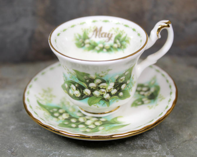 ROYAL ALBERT ' FLOWER OF THE MONTH  ' MINI CUP & SAUCER ENGLISH BONE CHINA 