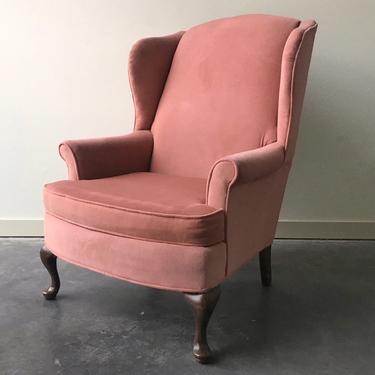 vintage pink wingback chair.