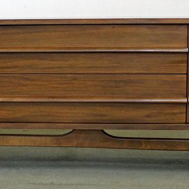 Mid-Century Danish Modern Elongated Low Concave-Front Walnut Credenza 