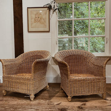 Pair of wicker arm chairs 