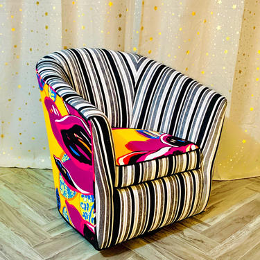 Custom swivel club chair with reversible seat and vintage designer upholstery fabric 
