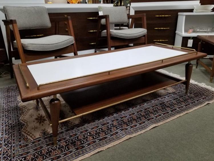 Mid-Century Modern walnut coffee table with brass accents