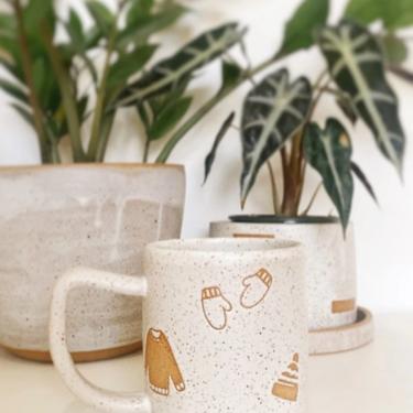 Winter Clothes Speckled Stoneware Mug in White 