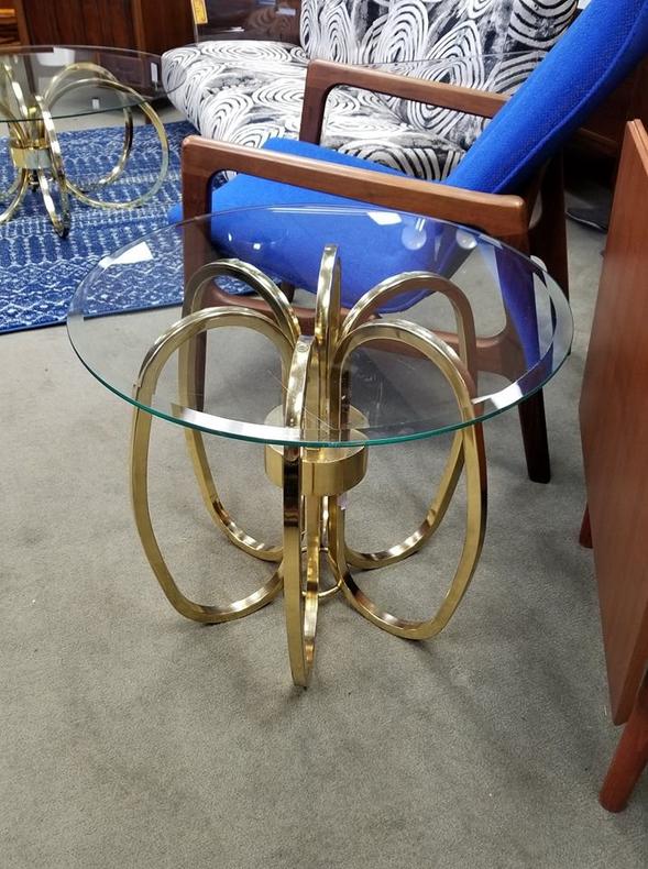                   Mid-Century Modern brass rings side table