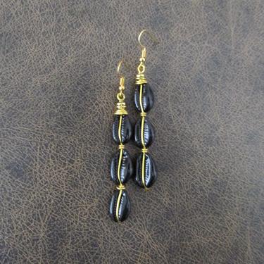 Black cowrie shell earrings, brass gold earrings, Afrocentric African earring, bold statement earring, art deco earrings, long dangle 