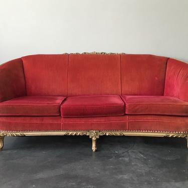 vintage red velvet sofa