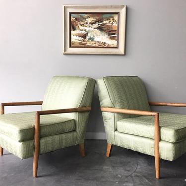 pair of vintage mid century modern lounge chairs.