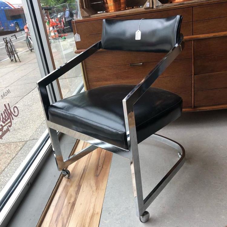                   Black vinyl and chrome modern chair (on wheels)! $125