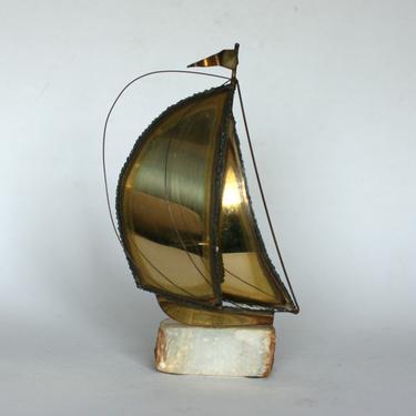 vintage Demott brass sailboat sculpture on quartz/mid century 