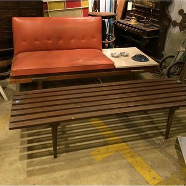 Mid Century sofa with and table and coffee table.