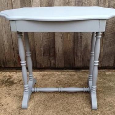 Antique turtle table, painted grayish blue