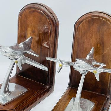 Pair of Chrome Art deco Style Airplane Bookends set on Wood 