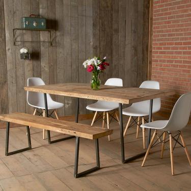 Hand Crafted Wood Dining Table with steel U base and reclaimed wood top.  Choose size, thickness and finish. 