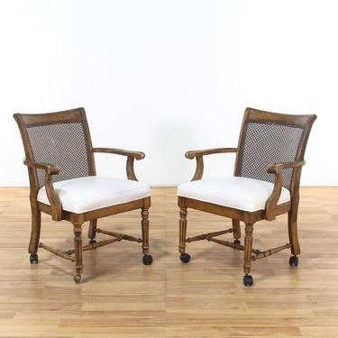 Pair of Dining Chairs W/ White Leather Seat On Casters