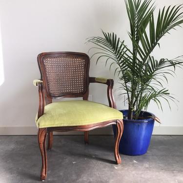 vintage lime green cane back armchair.