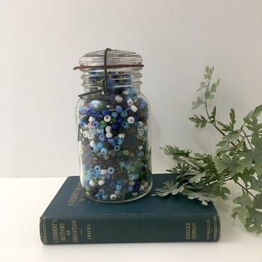 Glass pony beads - 2.5 Lb of beads in a vintage Atlas canning jar 