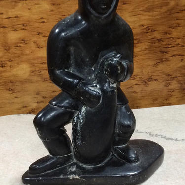 Carved soapstone Inuit figure with seal 6&amp;quot; , sculpture signed Allie 