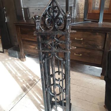 Antique salvaged iron newel post for a fence 