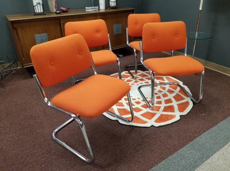                   Set of four vintage orange and chrome dining chairs by Allsteel