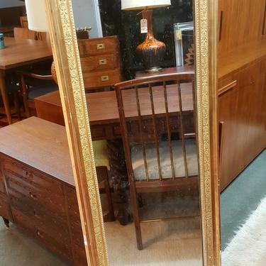 Antique full-length gilded mirror