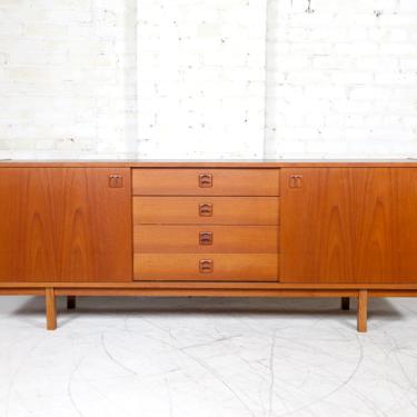 Vintage mcm Danish teak credenza / sideboard with 4 drawers and sliding doors | Free delivery in NYC and Hudson Valley areas 