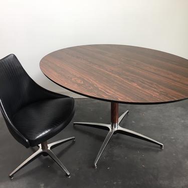 vintage mid century modern oval dining table by Virtue Furniture.