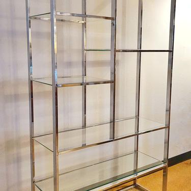 FLAT BAR CHROME AND GLASS ETAGERE IN THE MANNER OF MILO BAUGHMAN