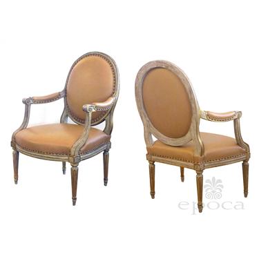 An Elegant Pair of French Louis XVI Style Grey/Green Painted and Parcel-gilt Arm Chairs/Fauteuils